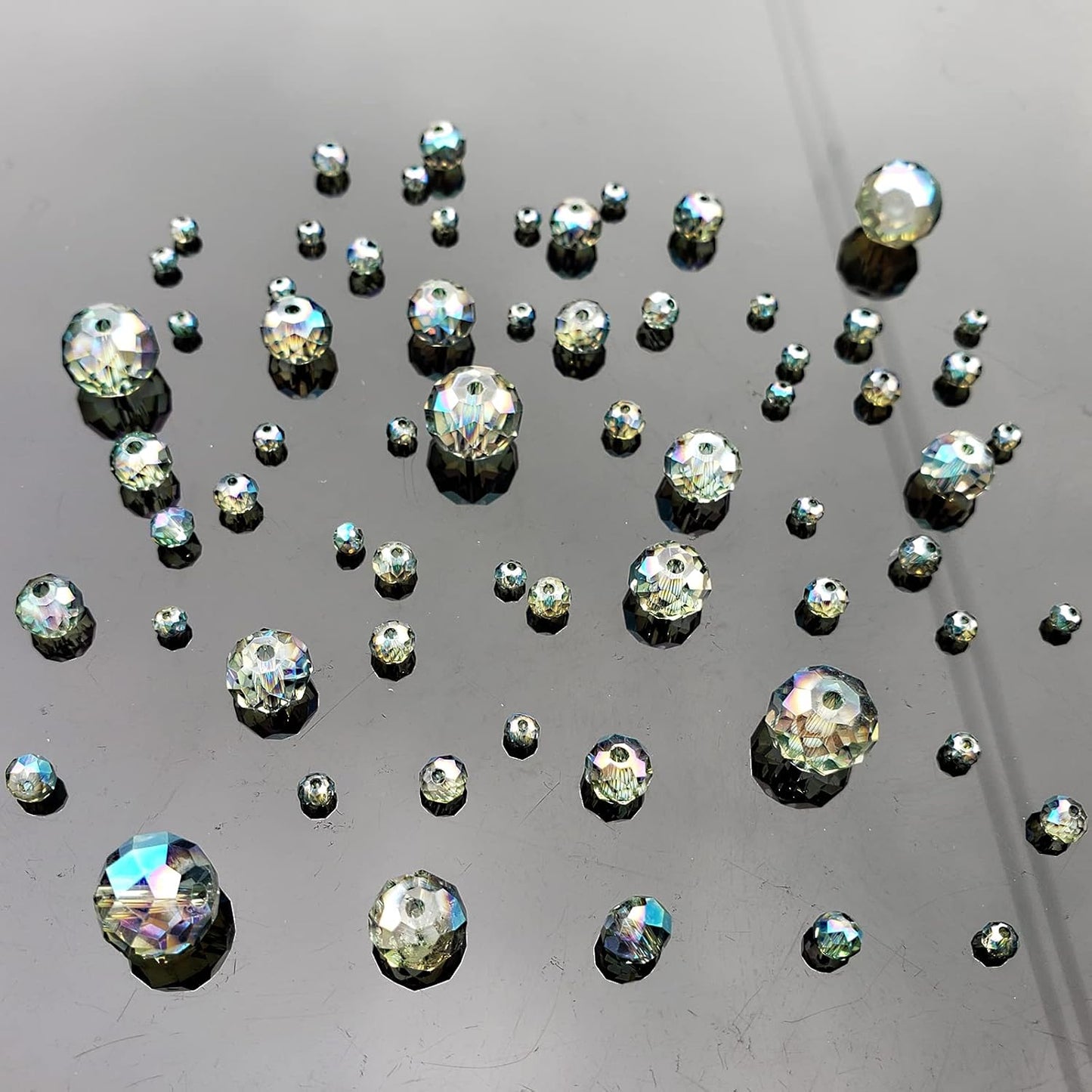 2-10mm Briolette Rondelle 810pcs Clear Green Crystal Glass Beads Faceted Shape Crystal Spacer Beads for Bracelet Necklace Decorative Hand Jewelry Making (2/4/6/8/10mm Clear Green)