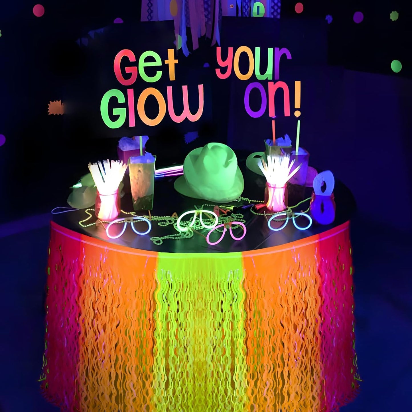 Mega-L Glow in The Dark Party Supplies, 4 Pack Neon Party Decorations Fluorescent Macaron Orange, Yellow and Fuchsia Wavy Metallic Tinsel Foil Fringe Table Skirts, Perfect Table Decors Glow Decors