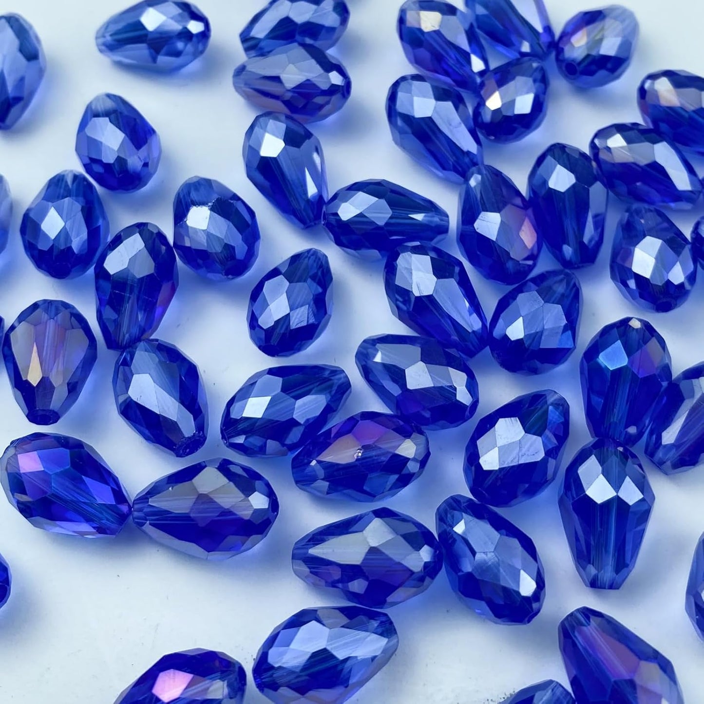 130pcs 6x8mm Teardrop Crystal Glass Beads Vertical Hole Faceted Glass Teardrop Spacer Beads for Bracelets Necklace Earring DIY Jewelry Making Craft(Blue AB)