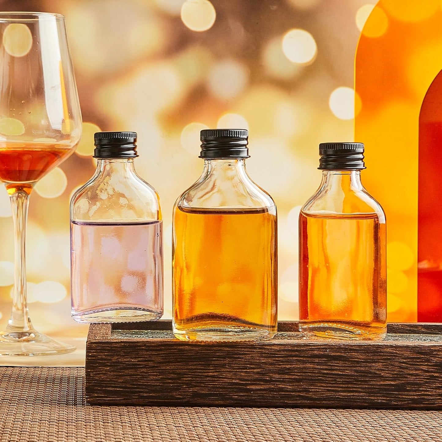 Patelai 16 Pcs Clear Glass Bottles with Caps Mini Glass Flask Liquor Bottles Empty Alcohol Shot Bottling Small Champagne Container DIY Gift for Wine Beverages Liquor Drinks Oil Beer (50 ml/ 1.7oz)