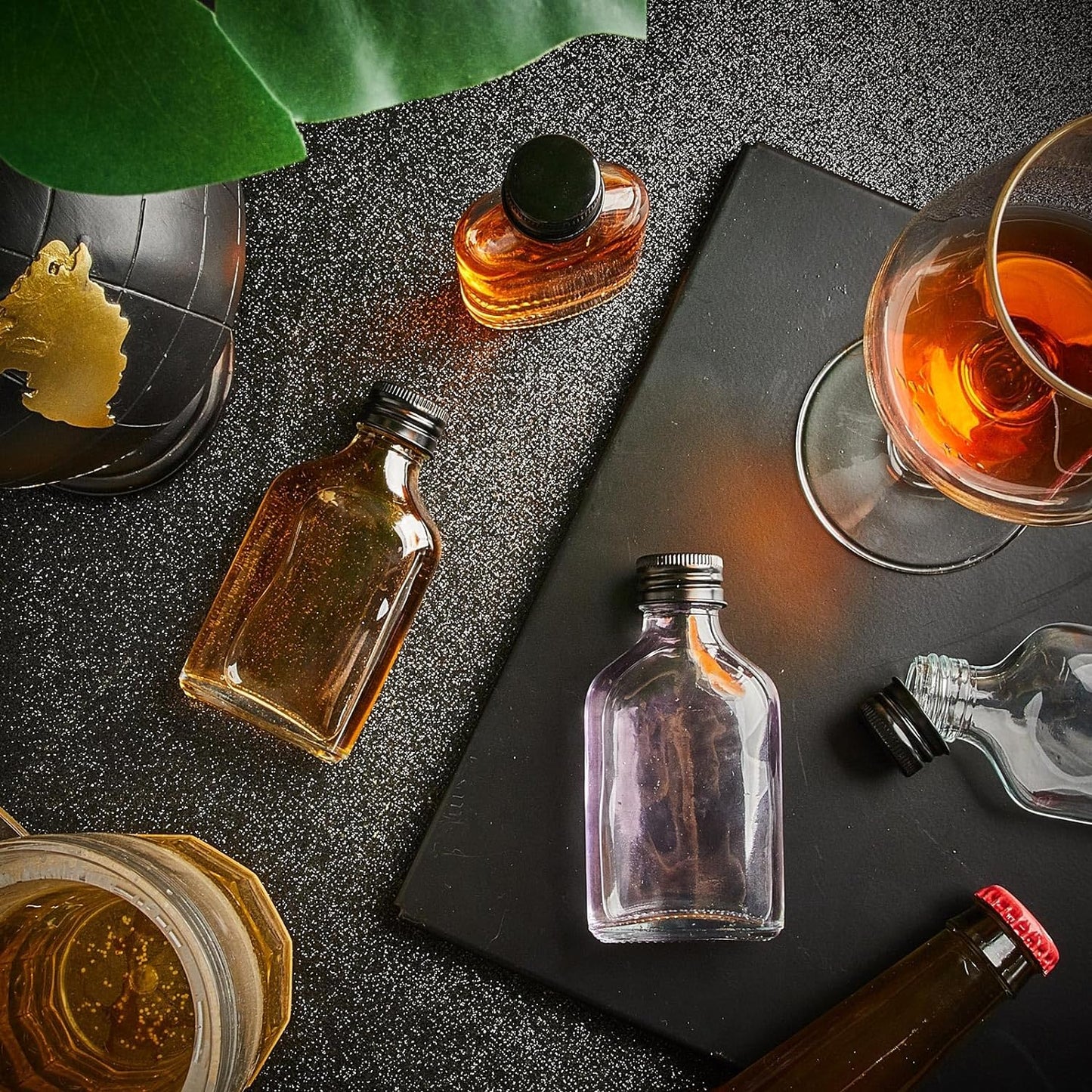 Patelai 16 Pcs Clear Glass Bottles with Caps Mini Glass Flask Liquor Bottles Empty Alcohol Shot Bottling Small Champagne Container DIY Gift for Wine Beverages Liquor Drinks Oil Beer (50 ml/ 1.7oz)